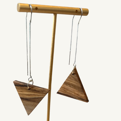 Close Up: Asymmetrical triangle threader earring. handcrafted olive wood and silver by Madera Design Studio