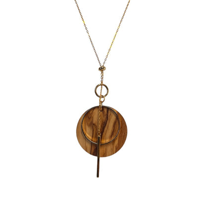 Gold lariat necklace with olivewood circle on a white background
