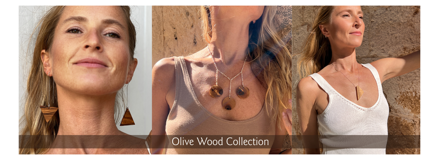 woman wearing various pieces of olive wood jewelry - by madera design studio